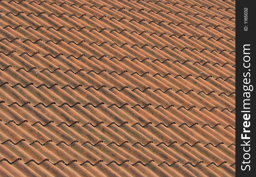 Red brick roof, all coloured stones. Red brick roof, all coloured stones