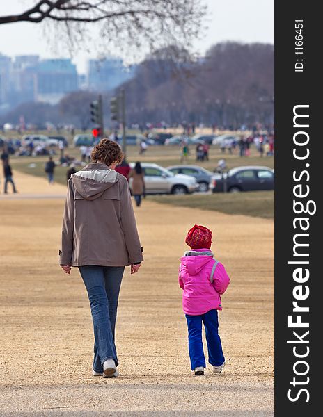 Mom with daughter walking on the Mall. Washington, DC