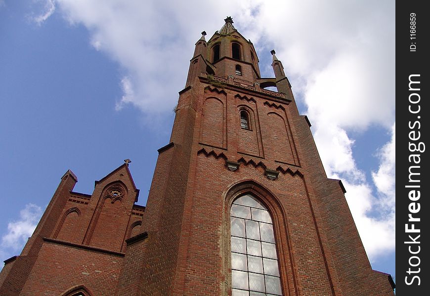 Old brick-red church in small town