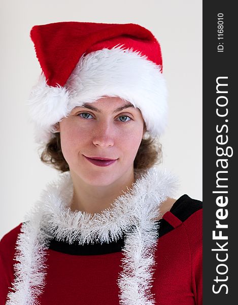 Portrait of young woman in santa's hat. Portrait of young woman in santa's hat