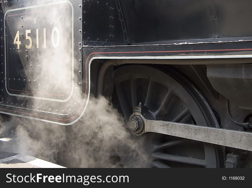 Steam rising from a steam engine.