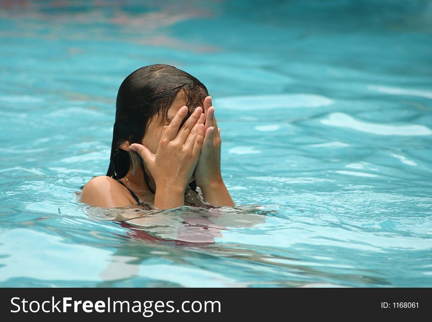Child having fun swimming in pool. Child having fun swimming in pool