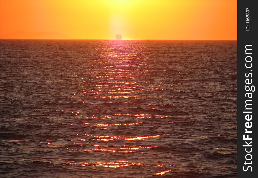 Sunset And Boat