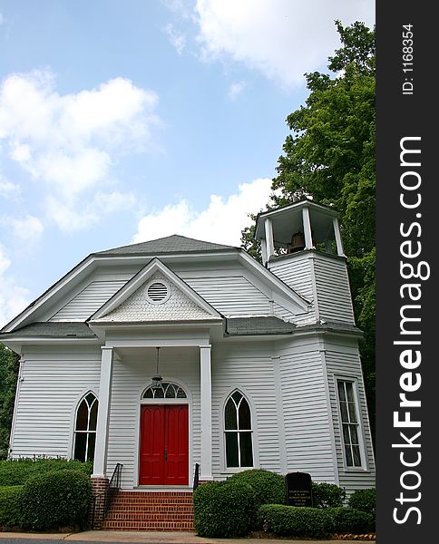 White church with red door