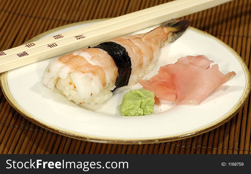 Photo of Shrimp Sushi and Chopsticks