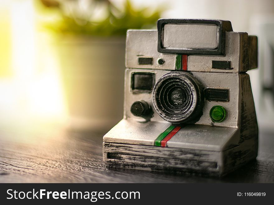 Photo of White Film Camera Miniature