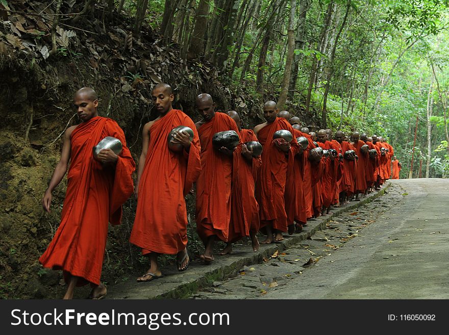 Monks Fall Inline on Sidewalk