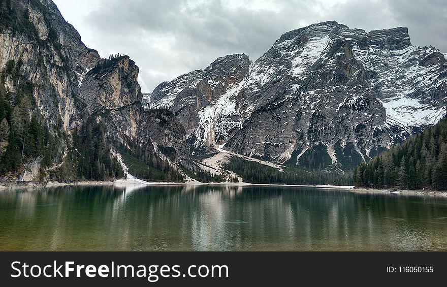 Snow Mountain Under Gray Cloudy Sky