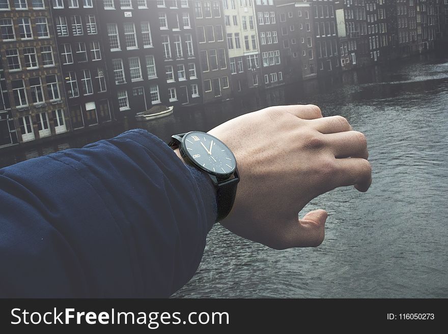 Close-Up Photography of a Person Wearing Wristwatch