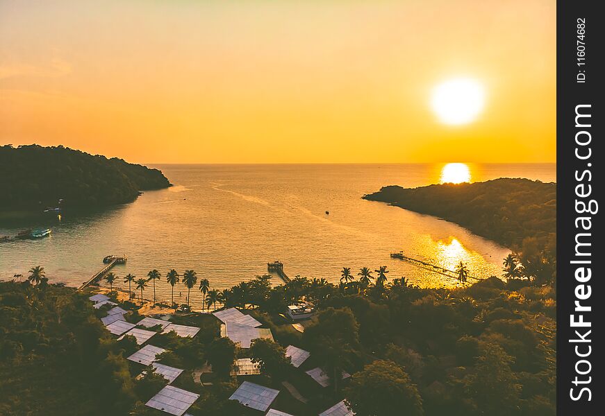 Aerial view of sea and beach with coconut palm tree on island