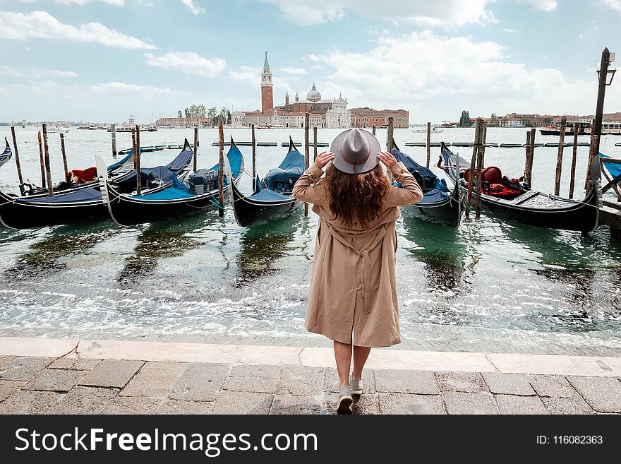 Woman On A Background Of Water In Venice