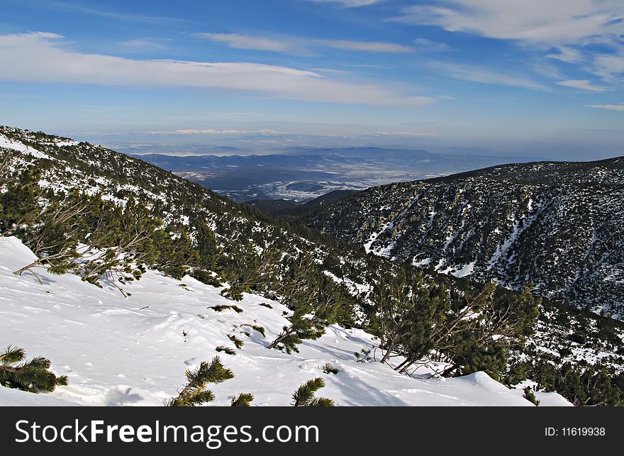 Panorame of winter mountains. Alpine ski resort Borovets, Bulgaria. Panorame of winter mountains. Alpine ski resort Borovets, Bulgaria