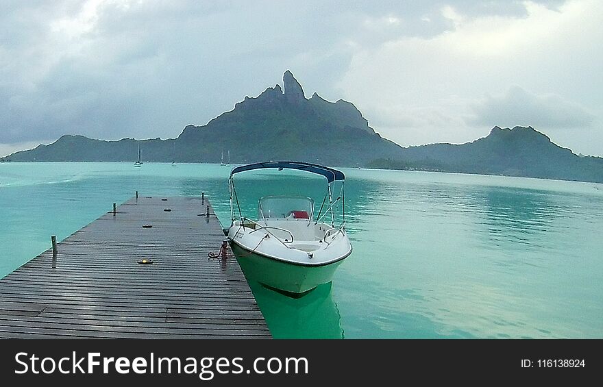 Take a quick boat ride to the fantastic Bora Bora clear blue lagoon , in French Polynesia. Even on a cloudy day, the water is amazing. Take a quick boat ride to the fantastic Bora Bora clear blue lagoon , in French Polynesia. Even on a cloudy day, the water is amazing.