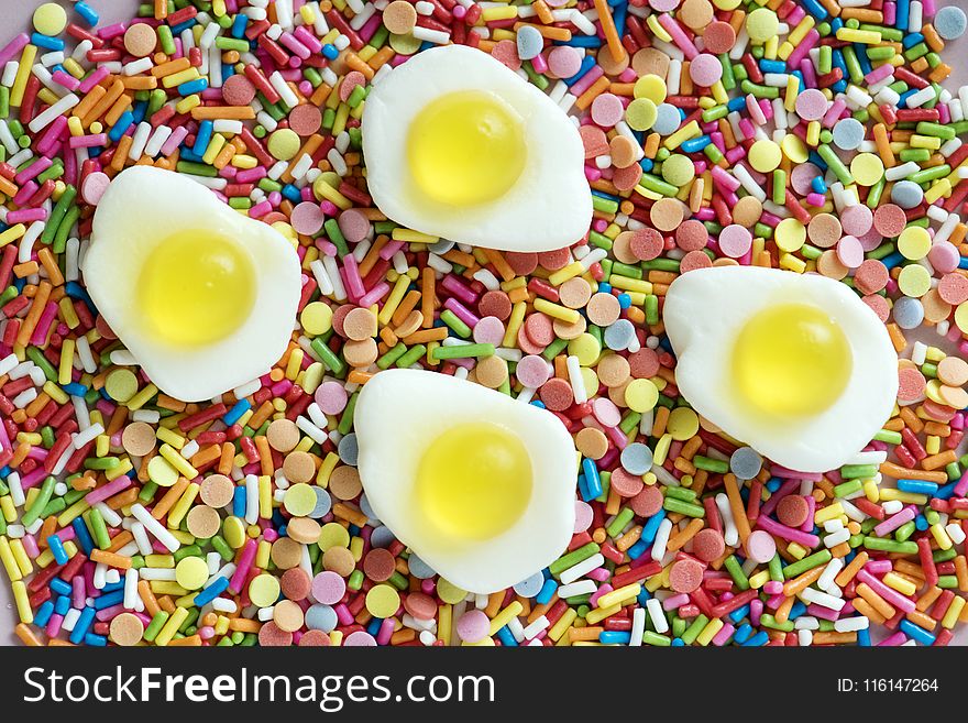 Four Sunny Side Up Egg Miniatures on Assorted-color Candies