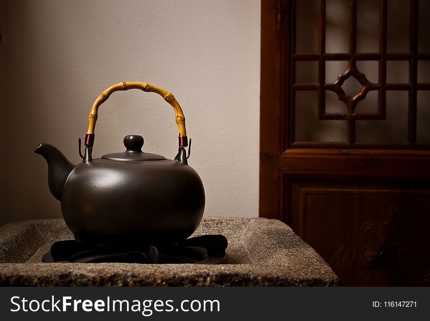 Unused Teapot On Side Table