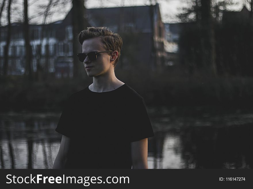 Photography of a Boy Wearing Sunglasses