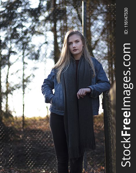 Woman in Blue Denim Jacket Standing