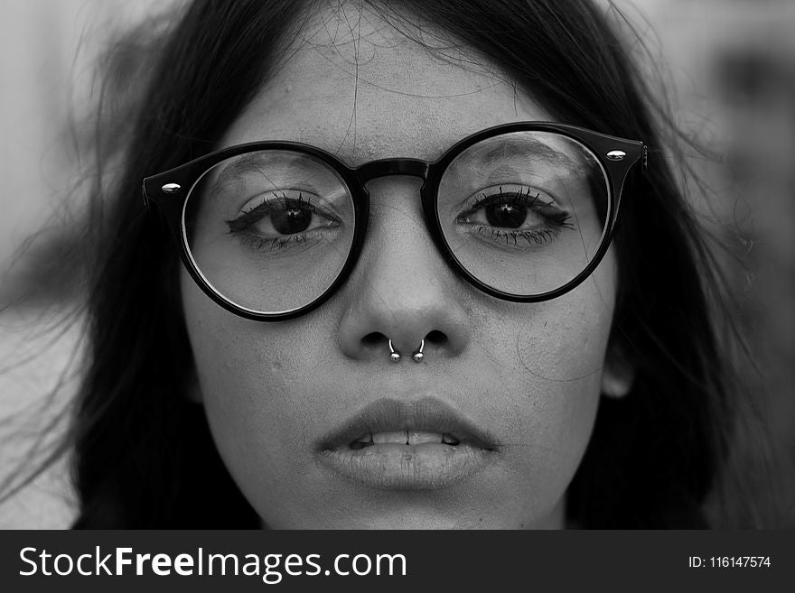 Closeup Photo of Woman Wearing Eyeglasses