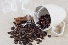 Fresh Roasted Coffee Bean Smoke And Spilled From Coffee Cup And Cinnamon On Retro Desk Stock Photos Fresh Roasted Coffee Bean Smoke And Spilled From Coffee Cup And Cinnamon On Retro Desk Stock Photos