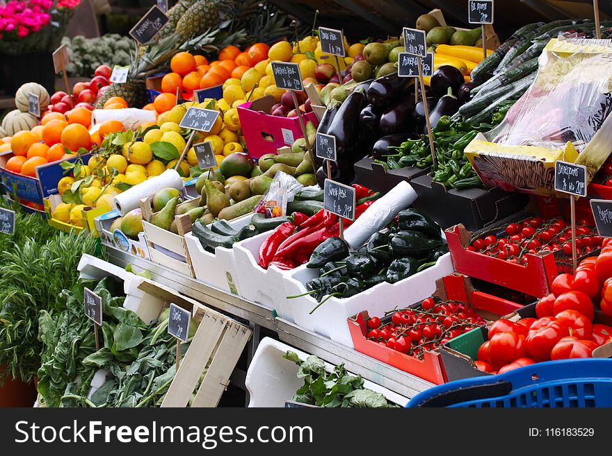 Fresh fruit and vegetables for sale at a street market, rhubarbs