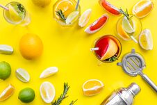 Mix Exotic Fruit Cocktail With Alcohol. Shaker And Strainer Near Citrus Fruits And Glass With Cocktail On Yellow Royalty Free Stock Photography Mix Exotic Fruit Cocktail With Alcohol. Shaker And Strainer Near Citrus Fruits And Glass With Cocktail On Yellow Royalty Free Stock Photography