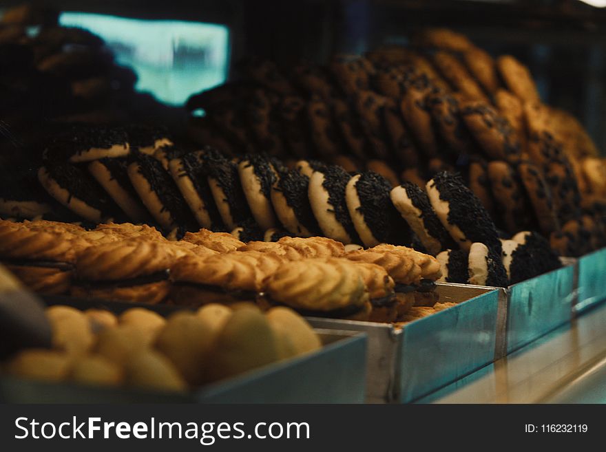 Selective Focus Photography of Doughnut and Cookies