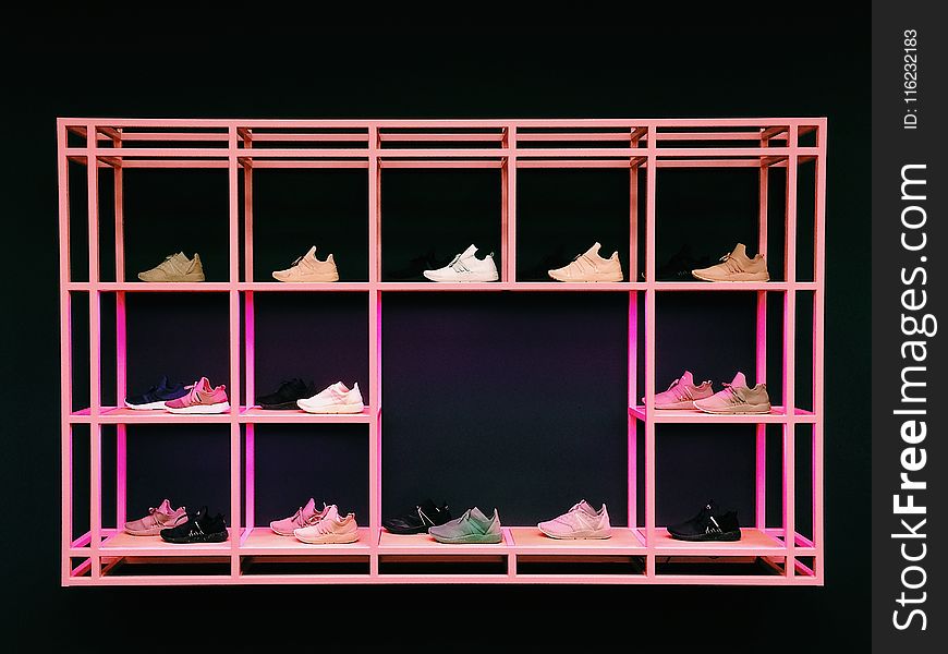 Pink Shoe Rack With Assorted-color-and-style Shoes