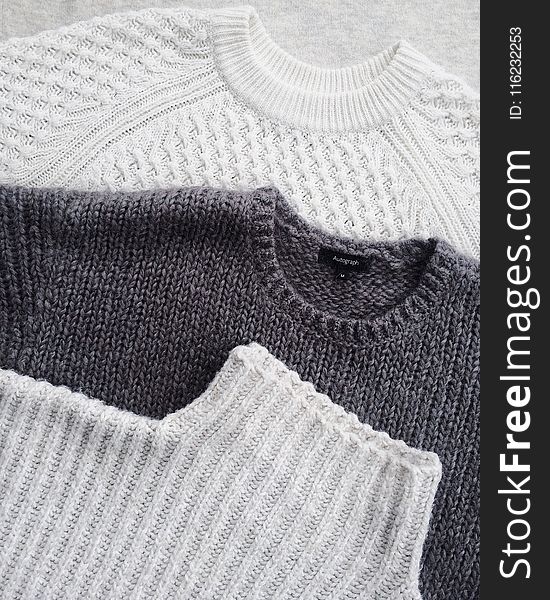 Close-up Photo of Three Sweatshirts