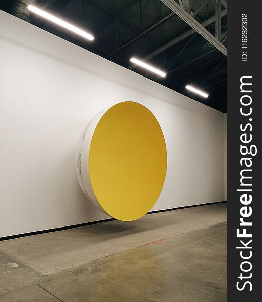 Yellow and White Bowl on Wall