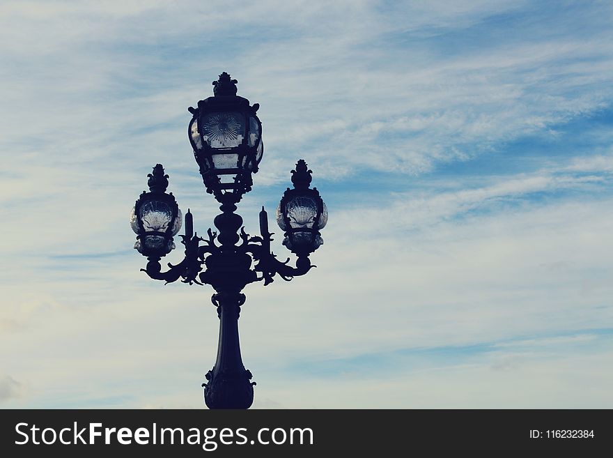 Black 3-in-1 Metal Post Under Blue And White Sky