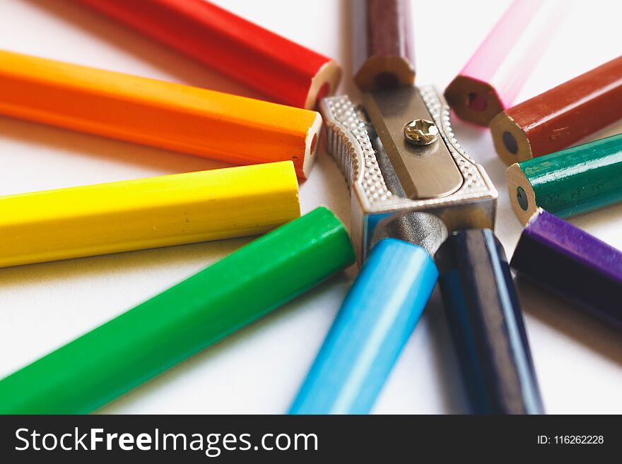 Rainbow from colored pencils. macro detail. sharpener silver