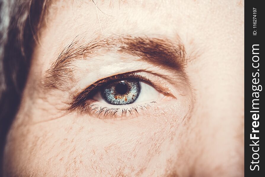 A beautiful insightful look woman`s eye. Close up shot.