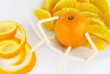 Orange And Orange Segments On A Plate Stock Photo Orange And Orange Segments On A Plate Stock Photo
