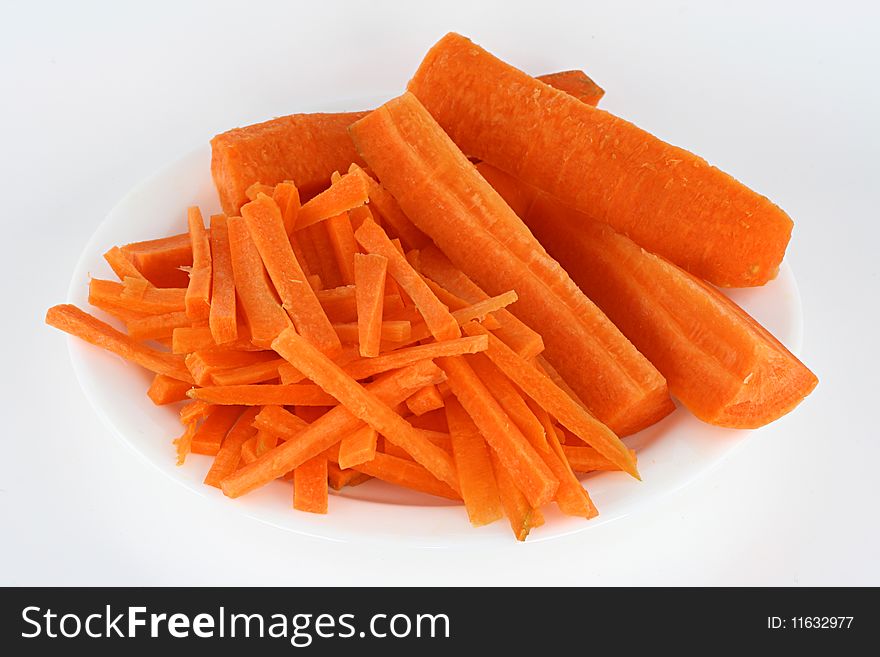 Slices of ripe bright carrots are prepared for to cook soup. Slices of ripe bright carrots are prepared for to cook soup.