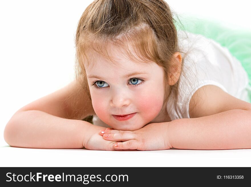 Portrait of a beautiful little girl. Face of the child close up