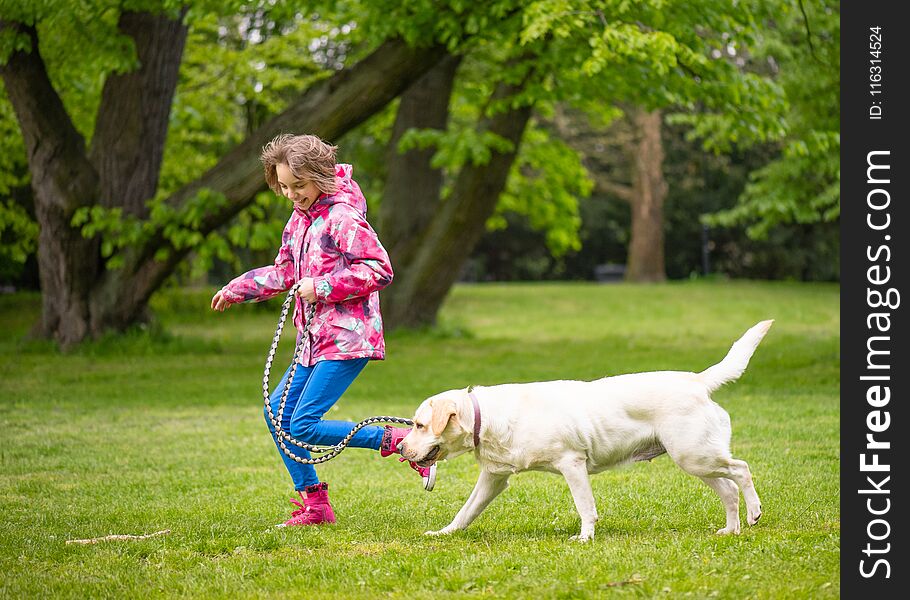 Girl With Labrador Retriever Dog