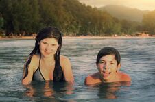 Teenager Siblings Couple Brother And Sister Swimming In The Sea Royalty Free Stock Photos