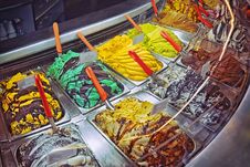 Many Boxes Of Typical Classic Italian Gourmet Gelato Ice Cream Display In Shop Stock Photography