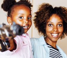 Adorable Sweet Young Afro-american Mother With Cute Little Daugh Royalty Free Stock Images