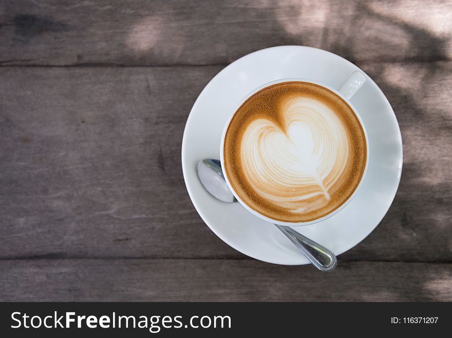 White Ceramic Cup on Saucer