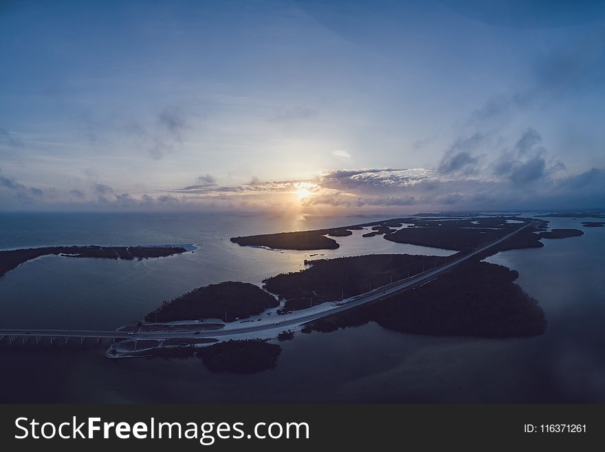 Aerial Photography of Island during Sunset