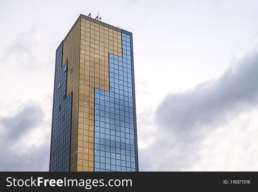 Brown And Blue High-rise Building