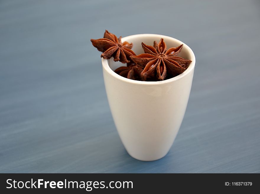Brown Star Anise on White Ceramic Mug