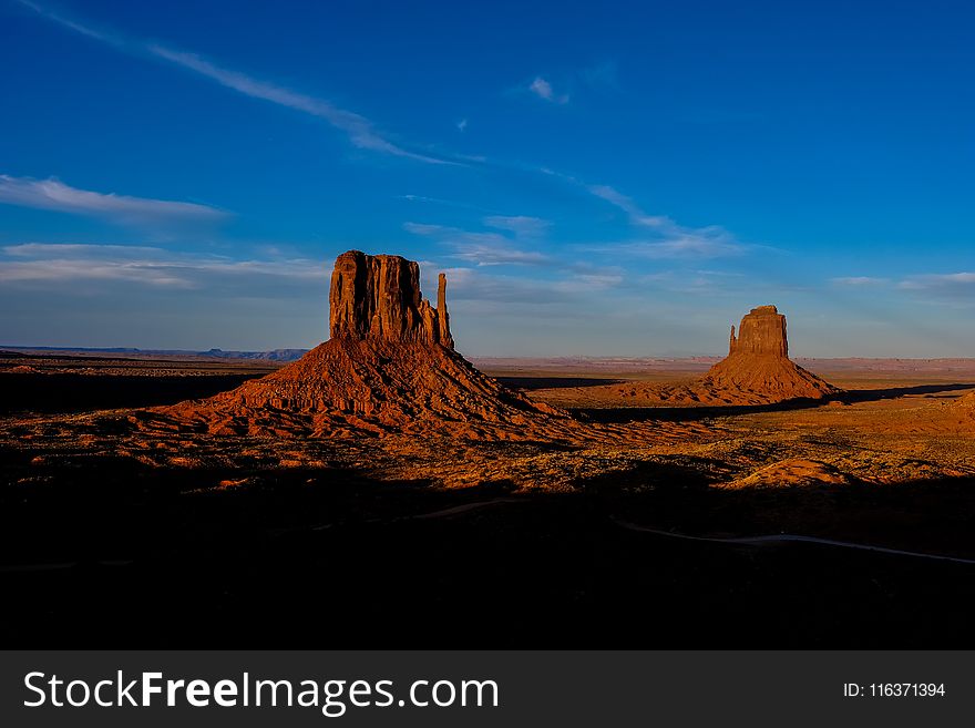 Photography Of Rock Formations Under Blue Skies