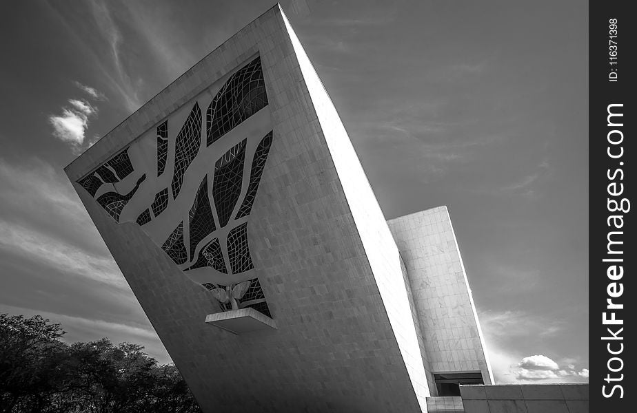 Grayscale Photo Of Concrete Building