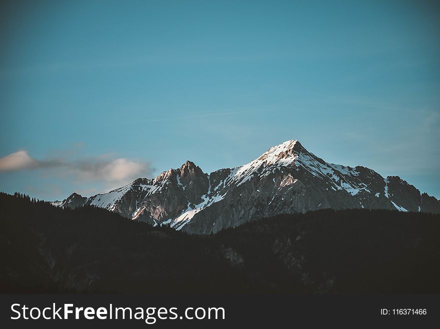 Snow-top Mountain Under Clear Sky