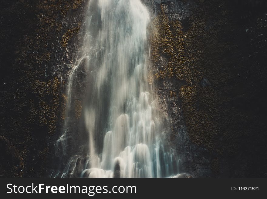 Photography of Waterfalls in Cave