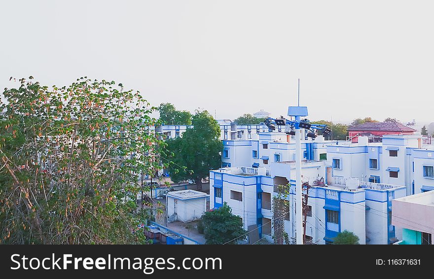 White And Blue Concrete Building Aerial Photography