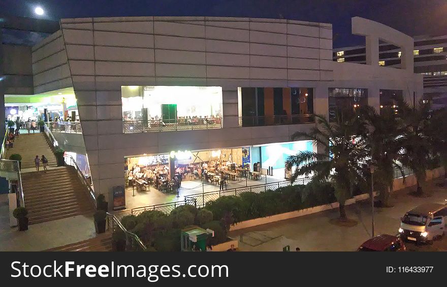 White Concrete Building during Night Time