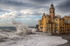 The Church And The Big Wave In Camogli Genoa, Italy. Stock Photo